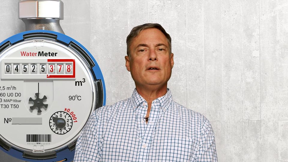 Todd Balash beside a water meter graphic